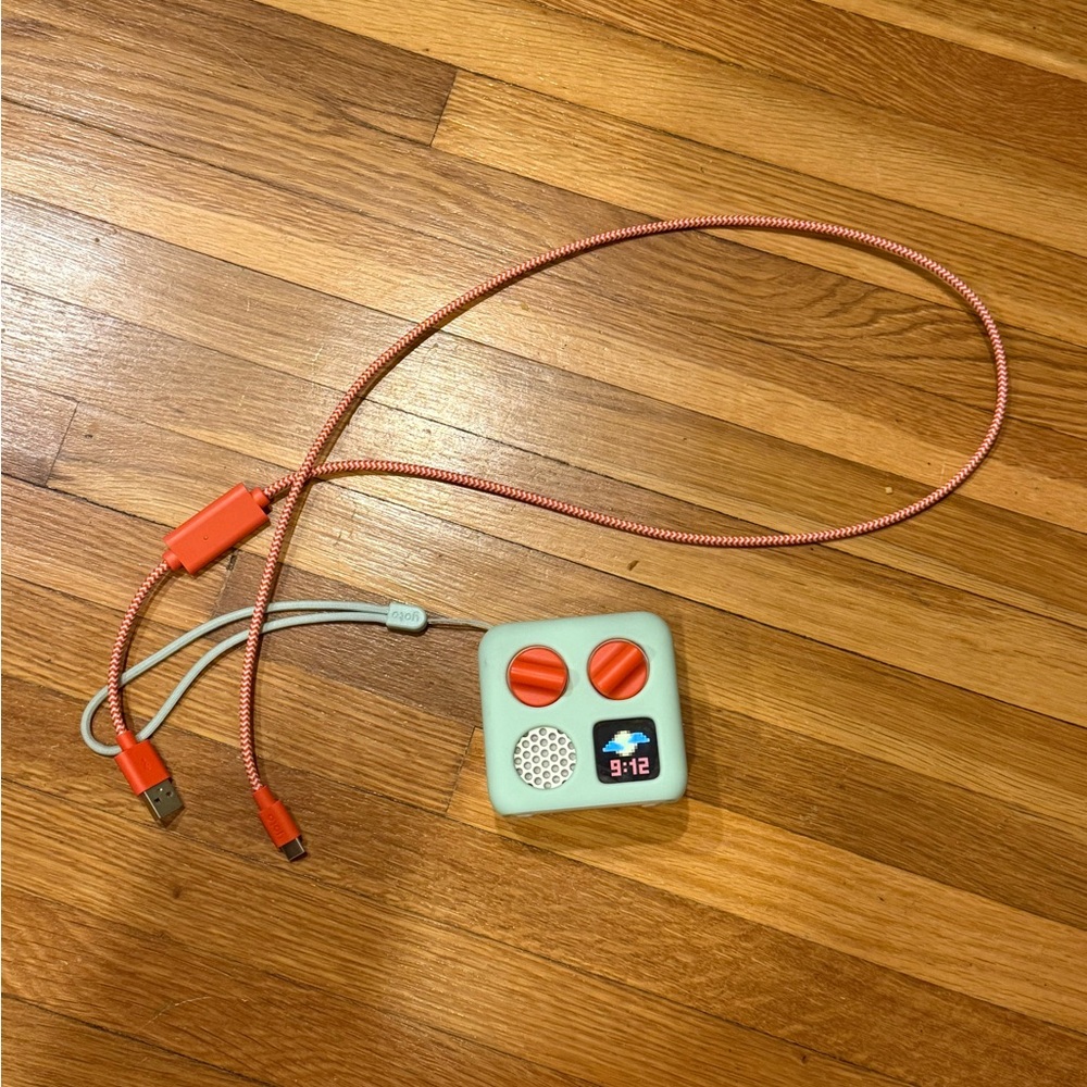 Portable Orange and White Electronic Device